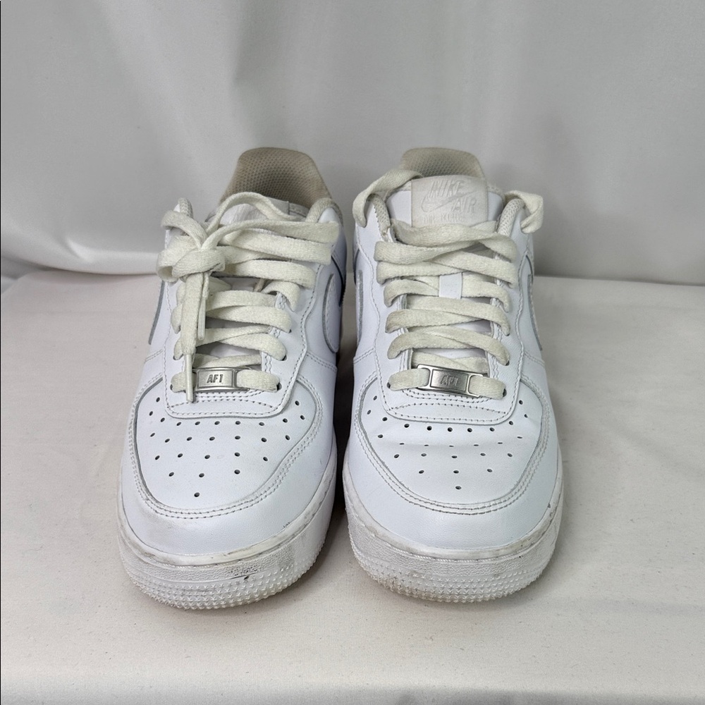 Nike Air Force 1’s White Low-Top Leather Sneakers